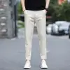 Loja de outlet de comércio exterior calças casuais cropped masculinas primavera-verão para pessoas de baixa estatura, calças retas slim fit ligeiramente afuniladas, calças longas finas, calças masculinas de 9 pontos