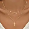 Collar con colgante de cruz creativo con cadena de clavícula de perlas artificiales transfronterizas de Europa y Estados Unidos, collar apilado multicapa retro