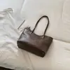 Bolso de axila sencillo de gran capacidad para el día a día, nuevo modelo otoño 2026, bolso tote de color liso único y dulce, bolso de hombro elegante