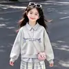 Estilo académico perezoso artístico otoño temprano nuevo sudadera con capucha de retazos a rayas solapa conjunto de pantalones casuales versátil estilo coreano para niñas