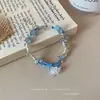 Pulsera Trenzada Estrella Hielo Transparente Retro Tejida a Mano Flor Blanca Azul Leche Verano Simple Nicho Versátil