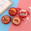 Bolsa para monedas de hojalata Caja de almacenamiento redonda para auriculares Bolsa para monedas Paquete de regalo navideño Fabricante Mayorista