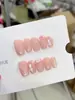 Nai Zi Puras Hechas a Mano Reutilizables Estilo Europeo y Americano B294 Rosa Nude Estilo Suave Uñas Portátiles Hechas a Mano con Flores de Cerezo 3D