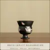 Taza de té de cerámica negra lisa con diseño pintado en oro, pintada a mano, adecuada para uso doméstico, para disfrutar del té y las ceremonias del té