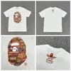 Camiseta unisex de manga curta da marca tendência BAPE, co-branded com design de camuflagem de cabeça de macaco, caimento solto de alta qualidade