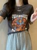 Camiseta de manga corta con hombros descubiertos estilo americano para mujer, diseño Sense Niche, nueva camiseta de verano holgada, ahuecada y adelgazante de algodón puro.