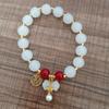 Pulsera de cuentas de jade blanco antiestilo chino nuevo Pulsera colgante retro de lujo ligero para mujer que combina con todo ins estilo antiguo moda nacional pulsera