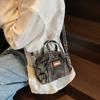 Bolsa de Almofada de Mão em Jeans Estilo Retrô 2025 Novo Modelo Bolsa de Ombro Transversal Feminina Moda Casual Tendência