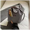 Bolsa Transversal Grande Capacidade para Mulheres Nova Moda 2025 Bolsa Tote de Trabalho para o Dia a Dia Bolsa Satchel Retrô de Nicho Bolsa de Ombro