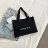 Bolsa de Lona Literaria de Nicho 2025 Nueva Bolso Cruzado de Lona con Estampado de Letras Casual Bolso Tote de Gran Capacidad Fábrica