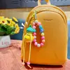 Chaveiro Pingente de Cabacinha Colorida de Contas Desenho Animado Corrente de Contas para Celular Pingente de Mochila Escolar Presente Venda por Atacado