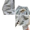 Pantalones casuales de primavera y otoño para hombres y mujeres, estilo occidental para bebés, personalidad infantil, marca de moda, estilo coreano, empalme de letras, pistas de pierna