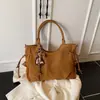 2026 Bolsa Grande Elegante e Personalizada Simples Bolsa de Ombro Transversal Casual Novo Estilo Bolsa Tote Feminina de Inverno