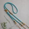 Collar de Cuerda con Lazo de Flor de Durazno Tejido a Mano Cuerda de Ocho Hilos Colgante Lateral Cruzado Cordón Colgante de Buda Dorado