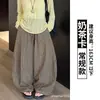 Pantalones de cuadros grises de pierna ancha para mujer, nuevo estilo otoño 2026, de cintura alta, adelgazantes, estilo coreano, casual, fluidos, pantalones de pierna curva