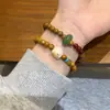 Nuevo brazalete de gato de madera de dibujos animados chinos lindo con cuentas cuerda elástica ajustable brazalete personalizado brazalete ajustable