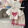 Conjunto de Verano para Niñas 2026 Nuevo Estilo Lazo Manga Corta Conjunto de Dos Piezas Moda Tendencia Ropa de Verano para Niños