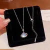 Colar de Aço Titânio com Zircônia Cintilante Estilo Novo Primavera e Verão, Corrente de Clavícula Versátil de Luxo Leve Nicho High-End para o Dia a Dia com Diamante Rosa Cubo de Açúcar