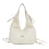Bolsos de nicho coreanos, bolso tote grande para mujer, bolso de hombro informal de moda para el trabajo, bolso tipo cubo simple y versátil