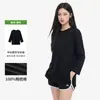 Camiseta lisa minimalista estilo japonês para mulheres, corte solto, gola redonda, emagrecedora, comprimento médio, algodão puro, mangas compridas, design único com fenda, peça básica fashion