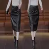 Falda midi con abertura para mujer, falda de cuero, nuevo estilo popular otoño e invierno 2026, longitud media, por encima de la rodilla, cintura alta, recta, ajustada al cuerpo