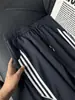 Pantalones Casuales de Retazos Rayados cleanfit para Hombre Verano Seda de Hielo Caída Micro Acampanados Raya Americana Ropa Deportiva