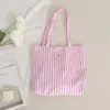 Bolsa de lona colorida a rayas estilo coreano inspired, bolsa de mano casual con contraste de colores suaves, bolsa de hombro ligera versátil para almacenamiento