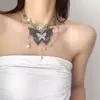 Cadena de cintura con borlas de mariposa azul y morado Y2K, accesorio resistente de subcultura moderno y genial, cinturón exagerado de nicho de alta gama para mujer