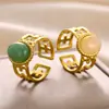 Anillo de piedra natural irregular Europa y Estados Unidos acero inoxidable chapado anti-decoloración oro de 18 quilates anillo de apertura femenino de alta calidad generación
