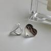 Pendientes de plata S925 con forma de corazón de melocotón brillante y diseño de nicho femenino, con diseño transfronterizo europeo y americano.