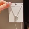 Collar de Cadena para Clavícula de Moda Exquisita Coreana y Japonesa de Lujo Ligero con Zirconia Cuadrada y Estrella, Diseño Versátil Elegante y Sencillo