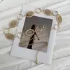 Nova Corrente de Cintura Retro de Luxo com Design Vazado, Incrustada com Diamantes, Pérolas e Strass, Acessórios de Metal Esculpido Modernos e Exquisitos, Corrente para Roupas