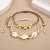 Pulsera de Concha de Suministro al Contado del Fabricante para Mujeres Parejas Transfronterizas Europeas y Americanas Estilo Hawaiano Playa Pulsera Trenzada Pulsera
