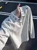 Camisa polo de punto acanalado con patchwork bordado estilo americano para hombre, de manga larga, otoño, estilo juvenil, corte holgado, hombro normal, camiseta de manga larga de peso pesado