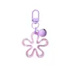 Llavero con hebilla de flor hueca transparente fresca y colorida, accesorio de campana, colgante para bolso, venta al por mayor