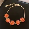 Pulsera Geométrica Redonda de Flor de Zirconia Chapada en Oro Real de 18 Quilates Lujo Accesible Joyería de Mano Exquisita Retro de Gama Alta de Nicho para Mujeres