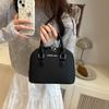 Bolsa de concha de estilo vintage, nueva y moderna para el verano de 2026, elegante, de color sólido, simple, a la moda, para hombro o cruzada, al por mayor