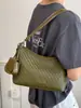 Bolso tejido de nicho súper popular para mujer, nuevo modelo 2026, versátil para el trabajo, bolso de hombro y cruzado, bolso tipo cubo de moda de alta gama