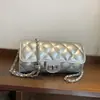 Bolsa pequena de alta qualidade feminina 2026 novo estilo estilo Coco Chanel moda grade de diamante bolsa de ombro única com corrente bolsa transversal cilíndrica bolsa almofada
