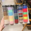 Versão coreana 20 latas de elásticos de cabelo de alta elasticidade elásticos de borracha sem costura temperamento simples argola de toalha corda de cabelo anel de cabelo atacado