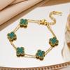 Pulsera de acero de titanio con trébol de cuatro hojas de la suerte de venta caliente transfronteriza, fritillary OL de doble cara dorada, moda europea y americana, nuevo temperamento que combina con todo