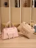 Bolsa de Mão Feminina Estilo Bolsa Kelly 2026 Moda Simples Bolsa de Ombro Bolsa Transversal Porta-Moedas Estoque de Fábrica Atacado
