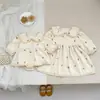 Novo Vestido de Primavera/Outono para Meninas Pequenas Macacão de Bebê Estilo Coreano Gola Boneca Manga Longa Roupinhas de Bebê Menina Vestido Infantil