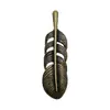 Accesorios retro para abrigos de hombre Garra de pájaro de plumas Personalidad para usar Accesorios de pareja para hombres y mujeres Accesorios Colgante de pluma