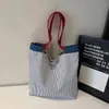 Bolsa tote de lona listrada Shuai Mi Jia para mulheres, nova bolsa de ombro de nicho de grande capacidade 2026