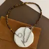 Collar de Piedra Ojo de Tigre con Cuentas Estilo Retro Maillard Otoño e Invierno Cadena para Clavícula Collar Elegante de Moda Joyería para Mujeres Alta Gama