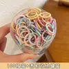 Ligas para el cabello de nailon de alta elasticidad Bandas para el pulgar Cuerdas para el cabello Bolsa de crisantemo Caja con empaque Accesorios para el cabello Ligas para el cabello infantiles Cuerdas para el pulgar