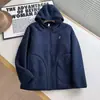Pedido de fábrica para chaqueta cálida con capucha gruesa de imitación de lana de cordero para parejas de hombres y mujeres, top con capucha moderno y versátil