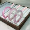 Venta al por mayor de fábrica Pulsera Brazalete Ojo de Gato Rosa Translúcido Hielo Barra Redonda Pulsera de Cascabeles Nuevo Estilo Chino Estilo Nacional Adornos Suministro para Transmisión en Vivo