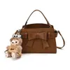 Bolso de mano con lazo para mujer, nuevo estilo coreano 2026, bolso tote cuadrado pequeño chic, bolso de hombro cruzado de nicho de alta gama, moderno